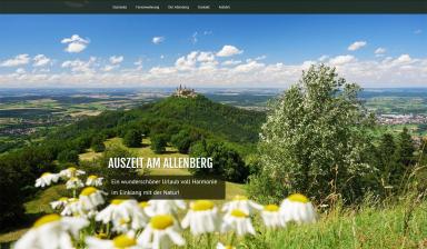 Screenshot Startseite Auszeit am Allenberg Weitblick auf Burg Hohenzollern im Sommer